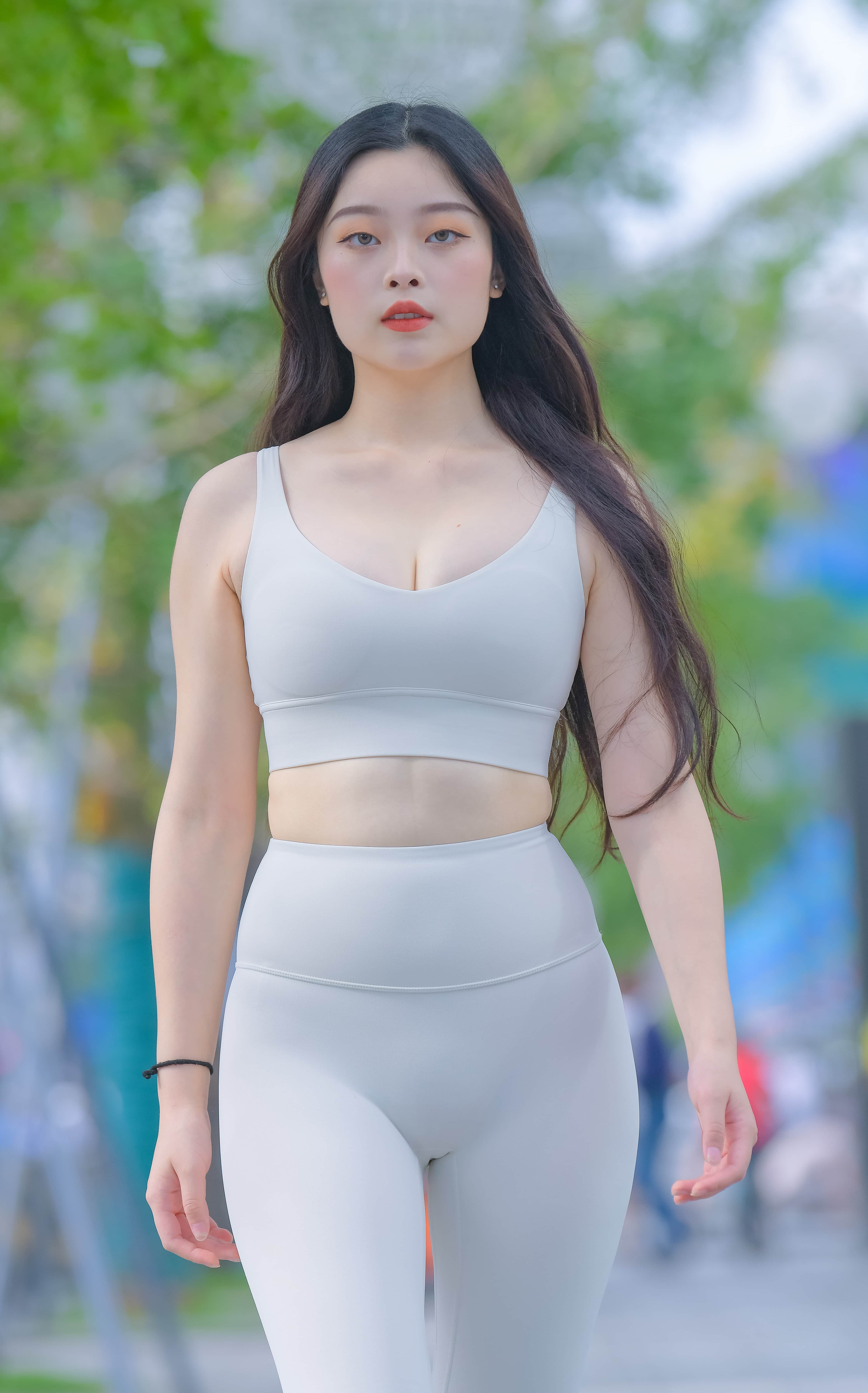 Luscious profile of plump legs and feet in sheer stockings, ankle slightly bent to showcase nylon texture and skin contrast.